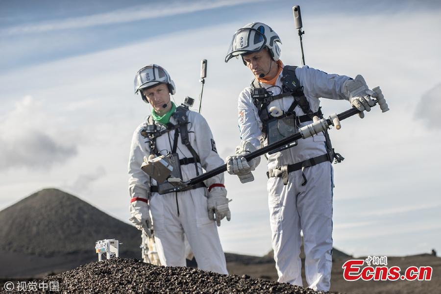 <?php echo strip_tags(addslashes(The Pangaea-X crew explore the barren and dry landscape of Lanzarote in the Canary Islands, Spain. Pangaea-X of the European Space Agency (ESA) is a test campaign that brings together geology, high-tech survey equipment and space exploration. Astronauts, scientists, operations experts and instrumentation engineers work side-by-side to advance European know-how of integrated human and robotics mission operations. (Photo/Agencies))) ?>