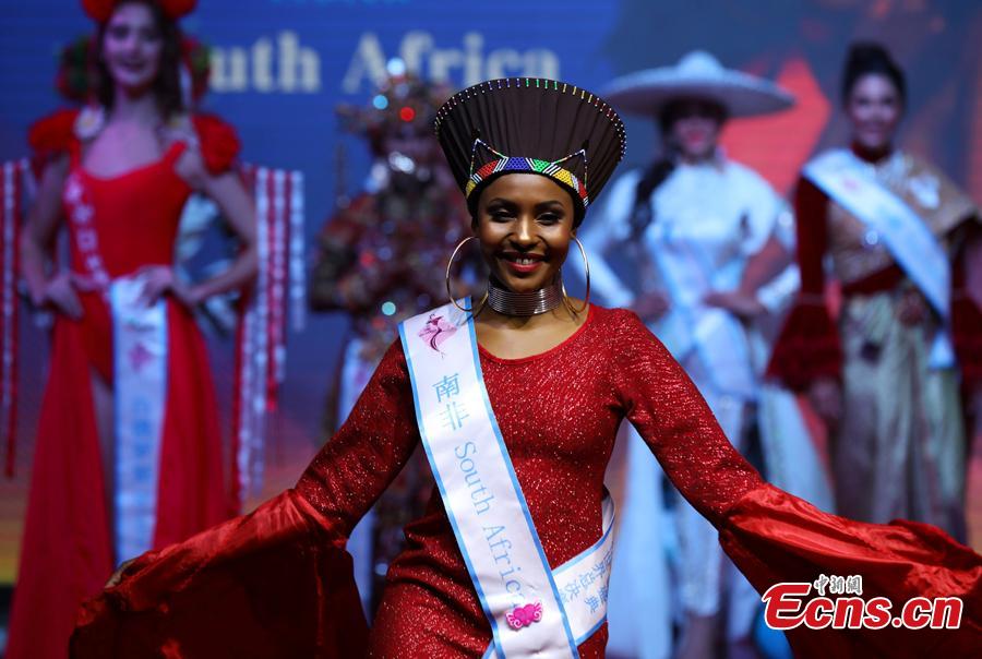 A participant competes in the world final of the 53rd Miss All Nations in Nanjing City, Jiangsu Province, Jan. 29, 2019. The pageant with the theme of eco-tourism included components of evening dress, bikini and national costumes. Participants from Russia, Mexico and Vietnam won the top three places. (Photo: China News Service/Yang Bo)