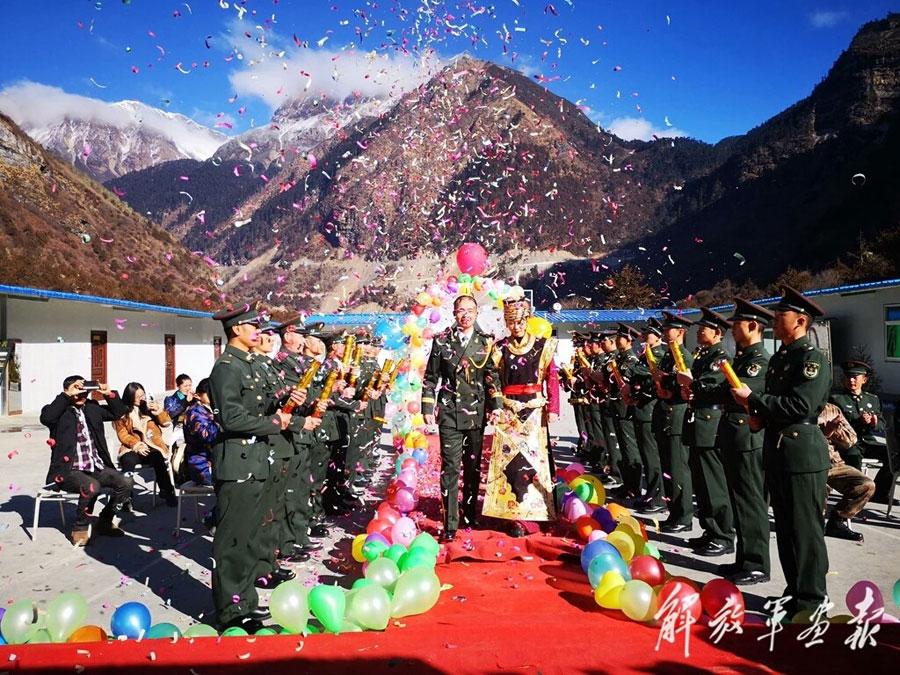 <?php echo strip_tags(addslashes(Wang Mei, 23, from Southwest China's Chongqing, holds a wedding ceremony with her husband Zhang Jinyuan, 30, at a frontier post in Yumai, Tibet autonomous region on January 13, 2019. (Photo provided to chinadaily.com.cn))) ?>