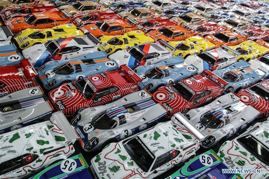 Model vehicles are displayed at the booth of Minichamps in the Spielwarenmesse exhibition in Nuremberg, Germany, Jan. 30, 2019. Spielwarenmesse, a leading international fair for toys, hobbies and leisure, kicked off in Nuremberg on Wednesday. Around 2,900 manufacturers from all over the world gathered at the annual trade fair, which will last until Feb. 3 and is expected to attract 71,000 visitors from over 125 nations and regions. (Xinhua/Shan Yuqi)