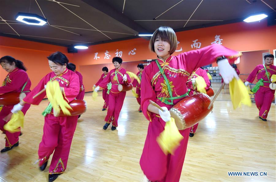 Trainees rehearse waist drum dance at a cultural center in Nanhe County, north China\'s Hebei Province, Jan. 30, 2019. More than 2000 people have participated in art training programs at a cultural center in Nanhe County as a way to enrich their life. (Xinhua/Zhu Xudong)
