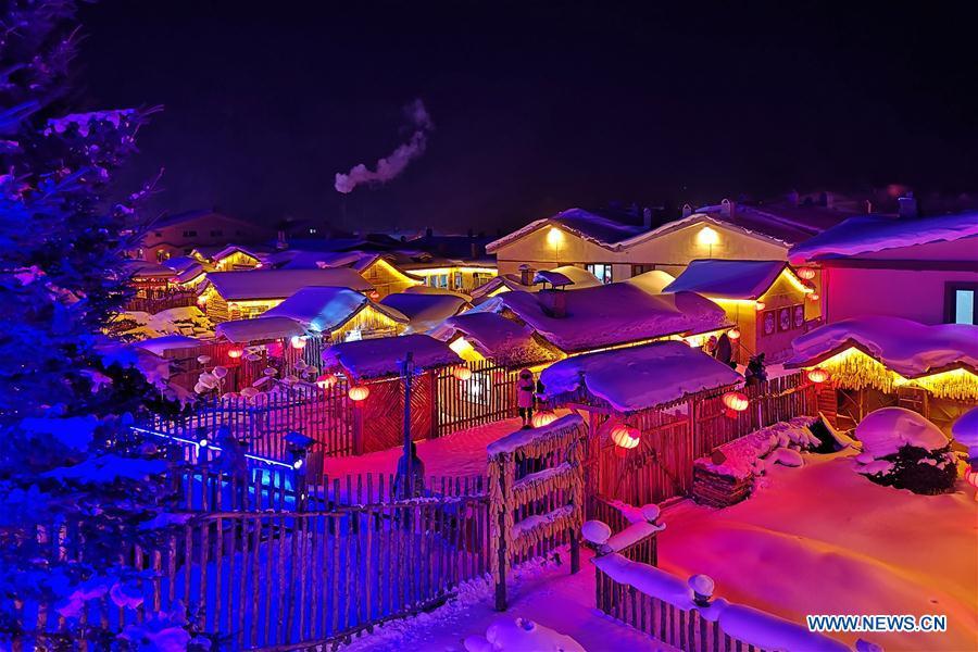 <?php echo strip_tags(addslashes(Photo taken by mobile phone shows the night view of Shuangfeng Forest Farm in Mudanjiang City, northeast China's Heilongjiang Province, Jan. 30, 2019. The Shuangfeng Forest Farm witnesses frequent snowfalls and is covered with snow for most of the year. The beautiful snow scenery here attracts many visitors from at home and abroad every year. (Xinhua/Yang Siqi))) ?>