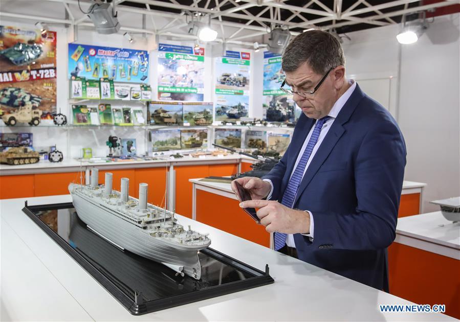 A visitor takes photos of a model ship displayed at the booth of Trumpeter in the Spielwarenmesse exhibition in Nuremberg, Germany, Jan. 30, 2019. Spielwarenmesse, a leading international fair for toys, hobbies and leisure, kicked off in Nuremberg on Wednesday. Around 2,900 manufacturers from all over the world gathered at the annual trade fair, which will last until Feb. 3 and is expected to attract 71,000 visitors from over 125 nations and regions. (Xinhua/Shan Yuqi)