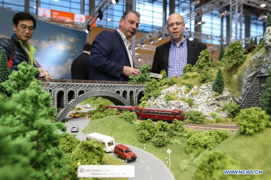 Visitors view model scenery displayed at the booth of NOCH in the Spielwarenmesse exhibition in Nuremberg, Germany, Jan. 30, 2019. Spielwarenmesse, a leading international fair for toys, hobbies and leisure, kicked off in Nuremberg on Wednesday. Around 2,900 manufacturers from all over the world gathered at the annual trade fair, which will last until Feb. 3 and is expected to attract 71,000 visitors from over 125 nations and regions. (Xinhua/Shan Yuqi)