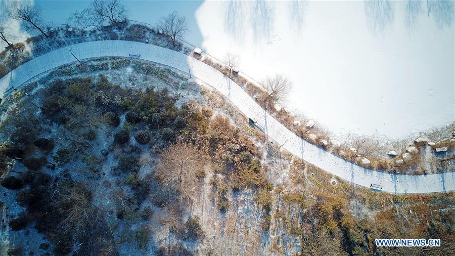 <?php echo strip_tags(addslashes(Photo taken on Jan. 31, 2019 shows the snow scenery of Yuehaiwan business district in Yinchuan, capital of northwest China's Ningxia Hui Autonomous Region. (Xinhua/Wang Peng))) ?>