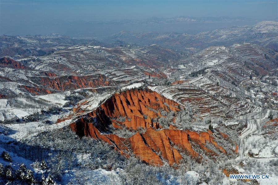 <?php echo strip_tags(addslashes(Aerial photo taken on Feb. 1, 2019 shows the snow-covered Hongshi (Red Rock) Gorge in Miaogou Village of Lushi County, central China's Henan Province. (Xinhua/Li Jianan))) ?>