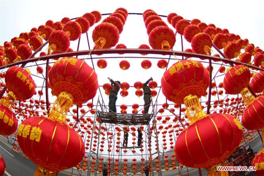 <?php echo strip_tags(addslashes(Workers hang red lanterns for the upcoming Spring Festival at Yingtaogou Village in Chadian Township of Shiyan City, central China's Hubei Province, Jan. 31, 2019. The Spring Festival, or the Chinese Lunar New Year, falls on Feb. 5 this year. (Xinhua/Cao Zhonghong))) ?>