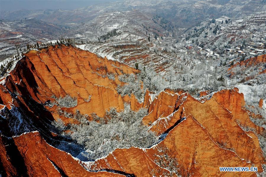 <?php echo strip_tags(addslashes(Aerial photo taken on Feb. 1, 2019 shows the snow-covered Hongshi (Red Rock) Gorge in Miaogou Village of Lushi County, central China's Henan Province. (Xinhua/Li Jianan))) ?>