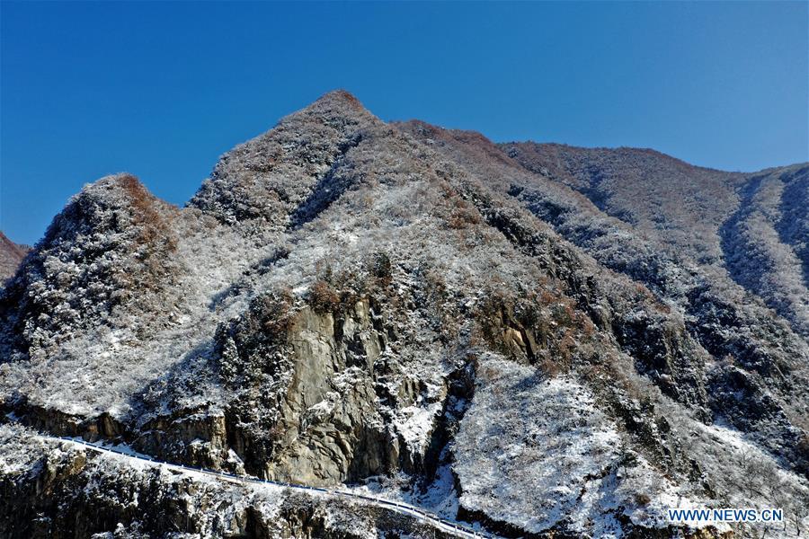 <?php echo strip_tags(addslashes(Aerial photo taken on Feb. 1, 2019 shows the snow scenery near Dasanggou Village of Lushi County, central China's Henan Province. (Xinhua/Li Jianan))) ?>