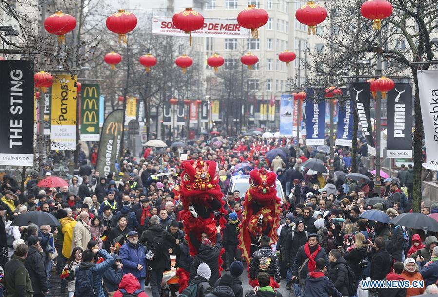 People take part in the 2019 Spring Festival parade in downtown Antwerp, Belgium, on Feb. 2, 2019. A long parade was held in the Belgian city of Antwerp on Saturday as part of the 2019 Spring Festival organized by the local Chinese community and Antwerp to mark the beginning of the Chinese New Year. (Xinhua/Ye Pingfan)
