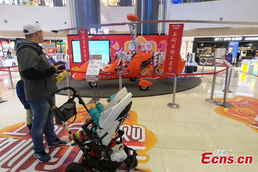 An autogyro, also known as a gyroplane, is on sale at a shopping mall in Shanghai, Feb. 2, 2019, ahead of the Spring Festival. The rotorcraft can fly at a maximum speed of 156 kilometers per hour and has a price tag of 691,800 yuan ($103,000). The mall is promoting it as the most expensive Lunar New Year gift. (Photo: China News Service/Zhang Hengwei)