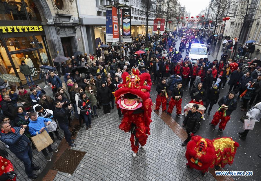 People take part in the 2019 Spring Festival parade in downtown Antwerp, Belgium, on Feb. 2, 2019. A long parade was held in the Belgian city of Antwerp on Saturday as part of the 2019 Spring Festival organized by the local Chinese community and Antwerp to mark the beginning of the Chinese New Year. (Xinhua/Ye Pingfan)