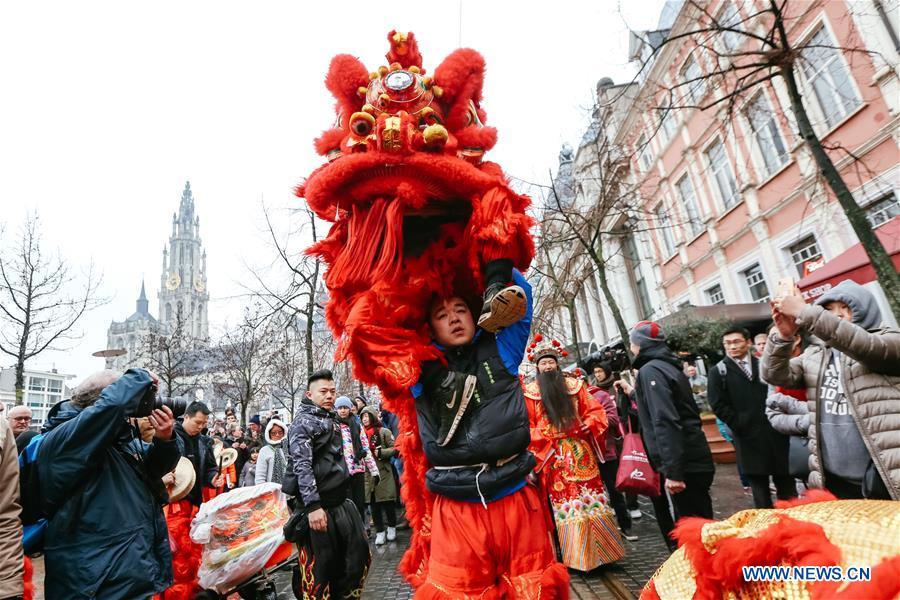 People take part in the 2019 Spring Festival parade in downtown Antwerp, Belgium, on Feb. 2, 2019. A long parade was held in the Belgian city of Antwerp on Saturday as part of the 2019 Spring Festival organized by the local Chinese community and Antwerp to mark the beginning of the Chinese New Year. (Xinhua/Zhang Cheng)
