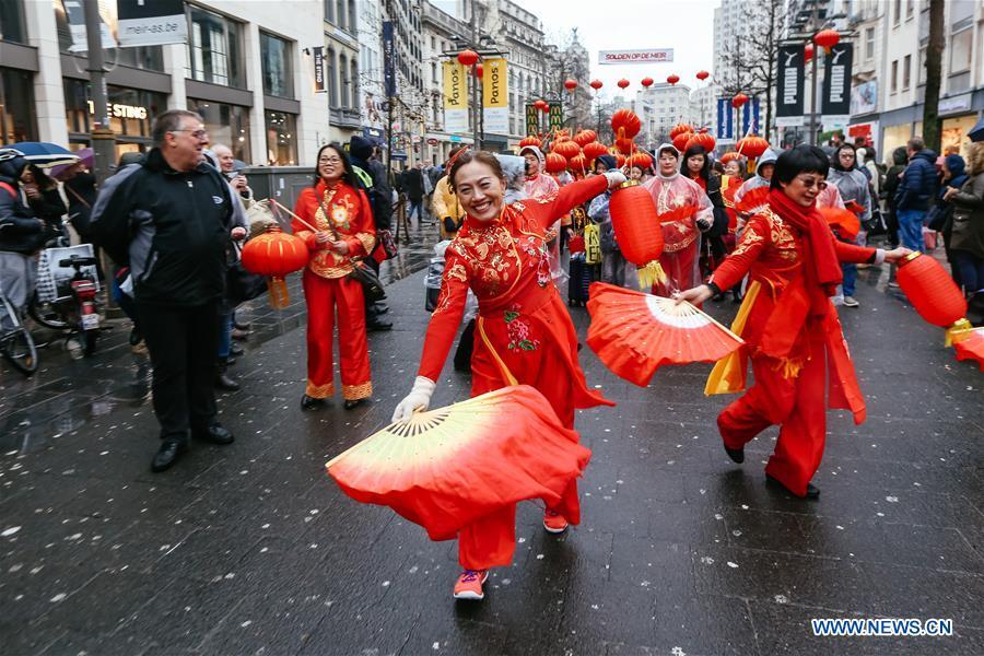 People take part in the 2019 Spring Festival parade in downtown Antwerp, Belgium, on Feb. 2, 2019. A long parade was held in the Belgian city of Antwerp on Saturday as part of the 2019 Spring Festival organized by the local Chinese community and Antwerp to mark the beginning of the Chinese New Year. (Xinhua/Zhang Cheng)