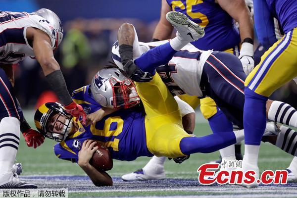 New England Patriots\' Dont\'a Hightower, top, sacks Los Angeles Rams\' Jared Goff (16) during the first half of the NFL Super Bowl 53 football game Sunday, Feb. 3, 2019, in Atlanta. The New England Patriots beat the Los Angeles Rams 13-3 on Sunday to capture a National Football League record-tying sixth Super Bowl title.(Photo/Agencies)