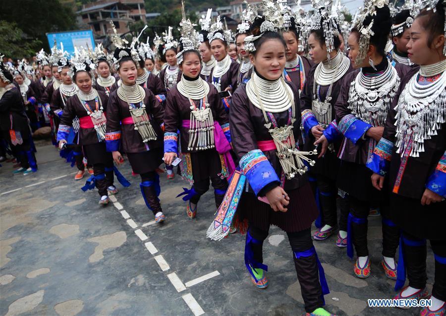 People of Dong ethnic group prepare to perform during the Spring Festival holiday in Dingdong Village of Qiandongnan Miao and Dong Autonomous Prefecture, southwest China\'s Guizhou Province, Feb. 8, 2019. (Xinhua/Long Linzhi)
