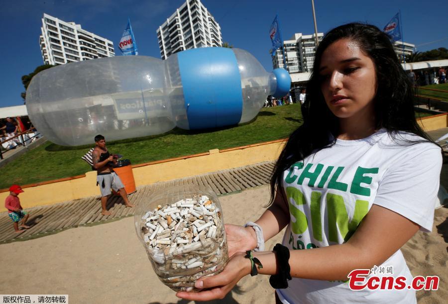 A giant plastic bottle is seen on a beach as part of a campaign by Greenpeace to warn of the presence of plastics on the coasts of Vina del Mar, Chile, Feb. 9, 2019. The campaign aims to end the flow of plastic into the oceans. (Photo/VCG)