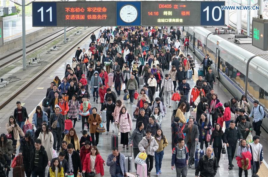 <?php echo strip_tags(addslashes(Passengers leave the platform after arriving at Fuzhou Railway Station in Fuzhou, southeast China's Fujian Province, Feb. 10, 2019. China witnessed a nationwide Spring Festival travel rush on Sunday when people started to return to work places from hometowns after family gatherings as the Spring Festival holiday came to an end. (Xinhua/Lin Shanchuan))) ?>