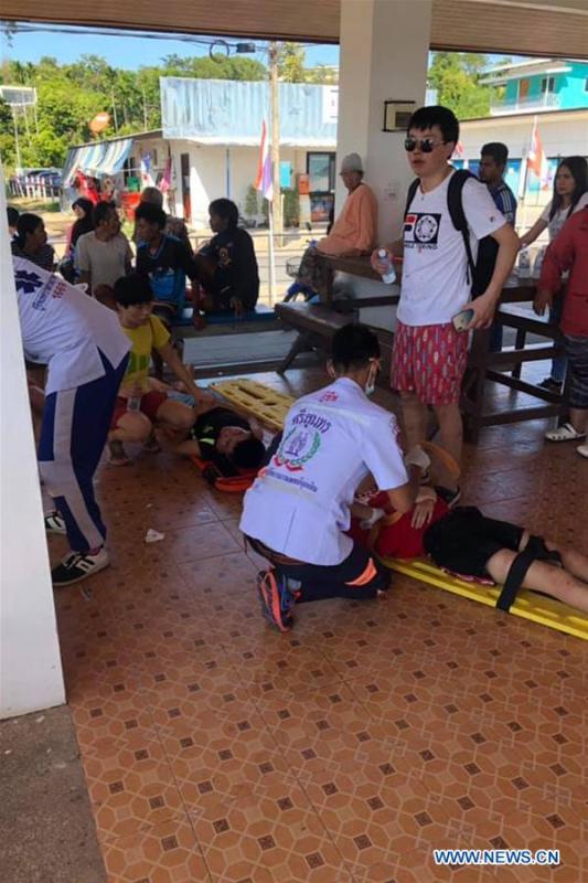 <?php echo strip_tags(addslashes(Rescuers help to treat tourists injured in the speedboat crash accident at the Phuket Island, Thailand, on Feb. 9, 2019. A total of 11 Chinese tourists and two crew members were injured after a tourist speedboat crashed with an oil barge near Thailand's southern Phuket Island on Saturday afternoon, the Chinese Consulate-General in the southern province of Songkhla confirmed on Sunday. (Xinhua))) ?>