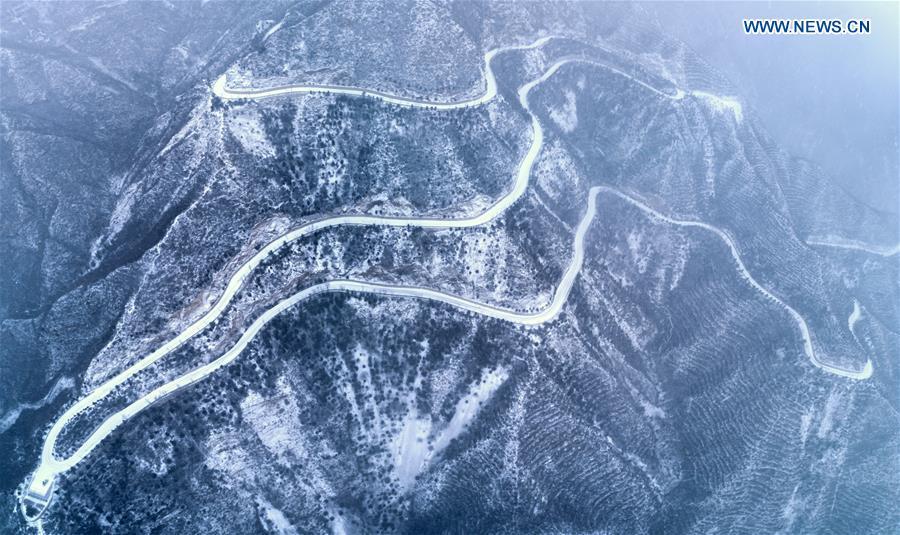 Aerial photo taken on Feb. 12, 2019 shows a snow view of the Yudu Mountain in Yanqing District of Beijing, capital of China. A snowfall hit Beijing on Tuesday. (Xinhua/Wei Lai)