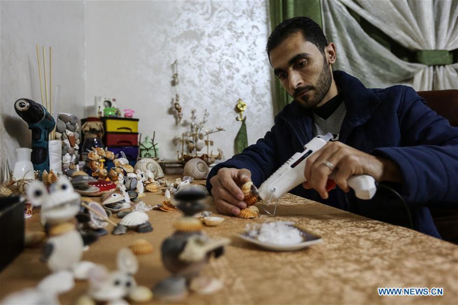<?php echo strip_tags(addslashes(Palestinian young man Ahmed al-Madhoun, 31, makes an art piece with seashells at his house in Gaza City, on Feb. 10, 2019. A Palestinian young man from Gaza turns seashells into beautiful artifacts that adorn his home to satisfy his passion for this type of art. Using seashells he collects from Gaza beaches, 31-year-old Ahmed al-Madhoun makes various art pieces such as animals, birds and some funny characters. Al-Madhoun, who holds a college degree in radio and television engineering and works for a local telecommunication company, has been collecting multiple forms of seashells from the Gaza seashore for more than four years. The young man began the hobby of seashell art about a year and a half ago, and he already made large numbers of art pieces.  (Xinhua/Stringer))) ?>