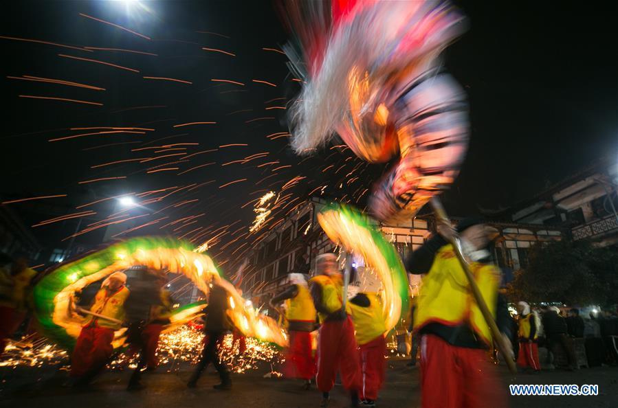 People perform dragon dance to celebrate the upcoming Lantern Festival, which falls on Feb. 19 this year, in Dafang County of Bijie City, southwest China\'s Guizhou Province, Feb. 13, 2019. (Xinhua/Luo Dafu)