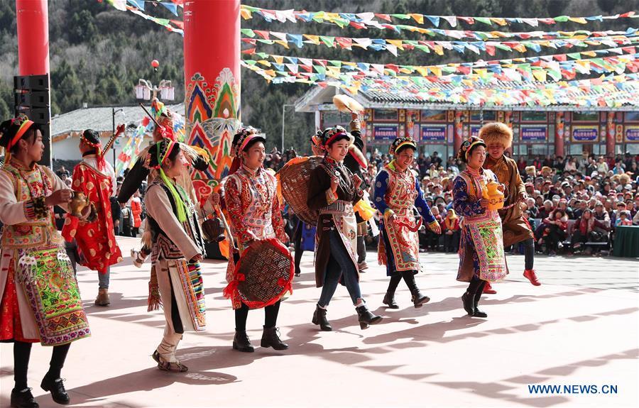 People of Tibetan ethnic group perform during the Shangjiu Festival at the foot of Jiajin Mountain in the Tibetan Township of Qiaoqi in Ya\'an City, southwest China\'s Sichuan Province, Feb. 13, 2019. The Shangjiu Festival, a traditional festival of the Tibetan people, is celebrated on the ninth day of the first lunar month to pray for a good harvest. (Xinhua/Jiang Hongjing)