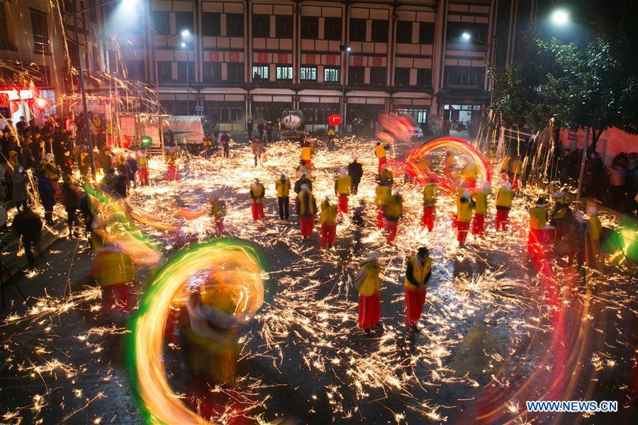 People perform dragon dance to celebrate the upcoming Lantern Festival, which falls on Feb. 19 this year, in Dafang County of Bijie City, southwest China\'s Guizhou Province, Feb. 13, 2019. (Xinhua/Luo Dafu)