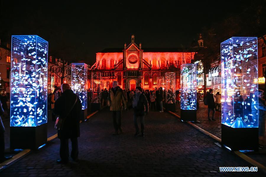Visitors view an artistic light installation on the Bright Brussels Festival in Brussels, capital of Belgium, Feb. 14, 2019. Featuring a dozen of light installations, Bright Brussels Festival is held from Feb. 14 to Feb. 17, aiming to present the magic of light to the public. (Xinhua/Zhang Cheng)