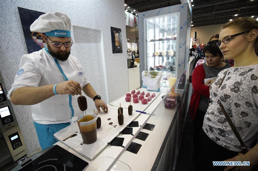 <?php echo strip_tags(addslashes(A confectionery cook makes popsicles at the Expo Sweet in Warsaw, Poland, on Feb. 17, 2019. Expo Sweet, one of the largest confectionery and ice-cream fairs in Poland, is held in Warsaw from Feb. 17 to 20. (Xinhua/Jaap Arriens))) ?>
