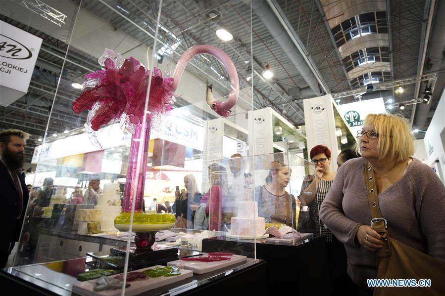 <?php echo strip_tags(addslashes(A flamingo-shaped cake is seen on display at the Expo Sweet in Warsaw, Poland, on Feb. 17, 2019. Expo Sweet, one of the largest confectionery and ice-cream fairs in Poland, is held in Warsaw from Feb. 17 to 20. (Xinhua/Jaap Arriens))) ?>