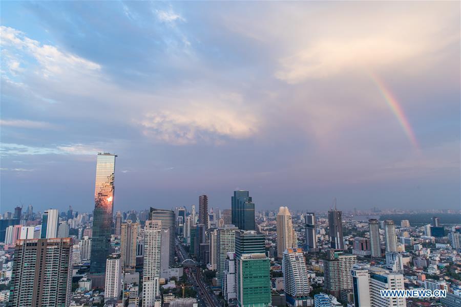 <?php echo strip_tags(addslashes(A rainbow appears in the sky after rainfall in Bangkok, Thailand, Feb. 17, 2019. The rainfall helped to improve the air quality in Bangkok. (Xinhua/Zhang Keren))) ?>
