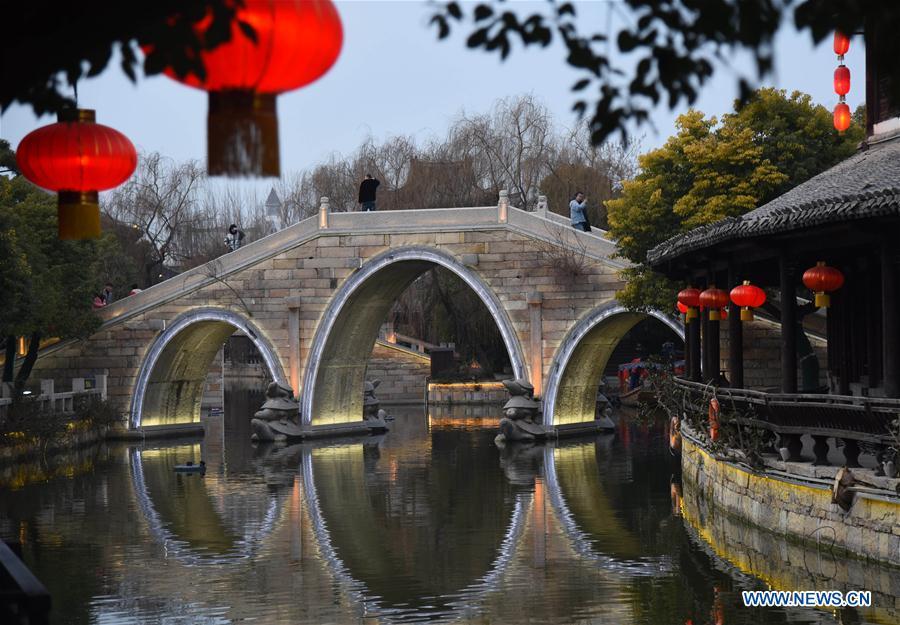 <?php echo strip_tags(addslashes(Tourists visit the ancient town of Taierzhuang in east China's Shandong Province, Feb. 16, 2019. (Xinhua/Wang Kai))) ?>