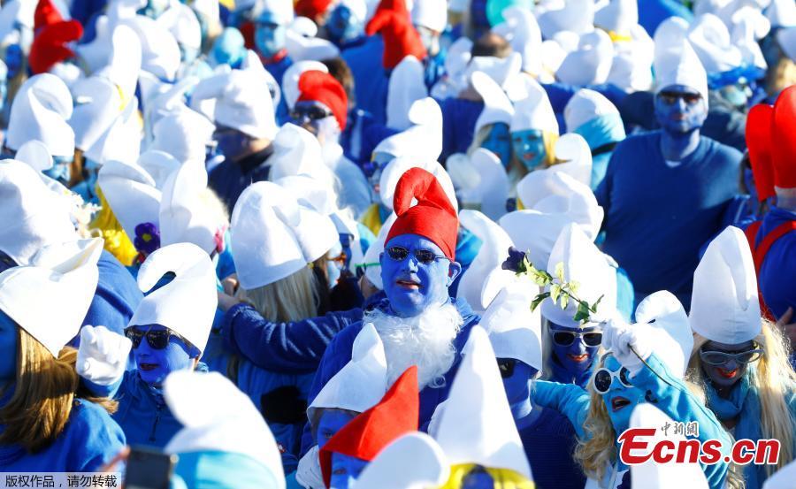 Participants dressed as smurfs pose during an attempt to hold the world\'s largest meeting of smurfs in a bid to outdo the previous record of 2,510 mostly student participants in Wales in 2009 in Lauchringen, Germany, Feb. 16, 2019. (Photo/Agencies)