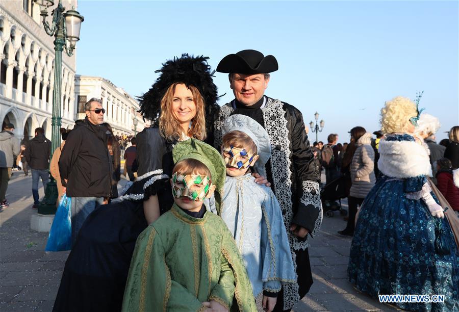 Revelers pose during the Venice Carnival in Venice, Italy, on Feb. 17, 2019. The Venice Carnival 2019 kicked off on Saturday and will last until March 5. (Xinhua/Cheng Tingting)