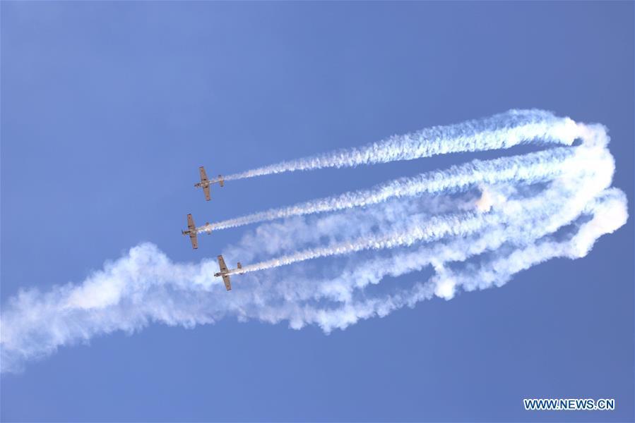 The Yakovlevs, a Britain-based aerobatic team flying Russian-designed Yakovlev aircrafts, attend the Aero India Show 2019 rehearsal over the Yelahanka air base in Bangalore, India, on Feb. 18, 2019. The five-day Aero India Show 2019 will start on Feb. 20. (Xinhua)