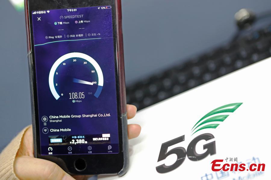 <?php echo strip_tags(addslashes(A passenger tests the 5G network and services in the Shanghai Hongqiao Railway Station, Feb. 18, 2019. The railway station, one of the world's busiest, will become the world's first 