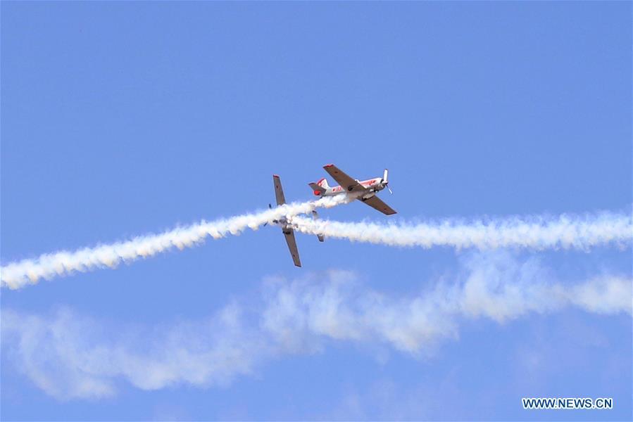 The Yakovlevs, a Britain-based aerobatic team flying Russian-designed Yakovlev aircrafts, attend the Aero India Show 2019 rehearsal over the Yelahanka air base in Bangalore, India, on Feb. 18, 2019. The five-day Aero India Show 2019 will start on Feb. 20. (Xinhua)