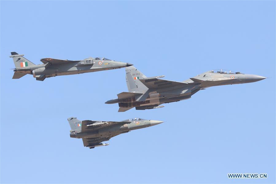 Sukhoi and Tejas aircrafts attend the Aero India Show 2019 rehearsal over the Yelahanka air base in Bangalore, India, on Feb. 18, 2019. The five-day Aero India Show 2019 will start on Feb. 20. (Xinhua)