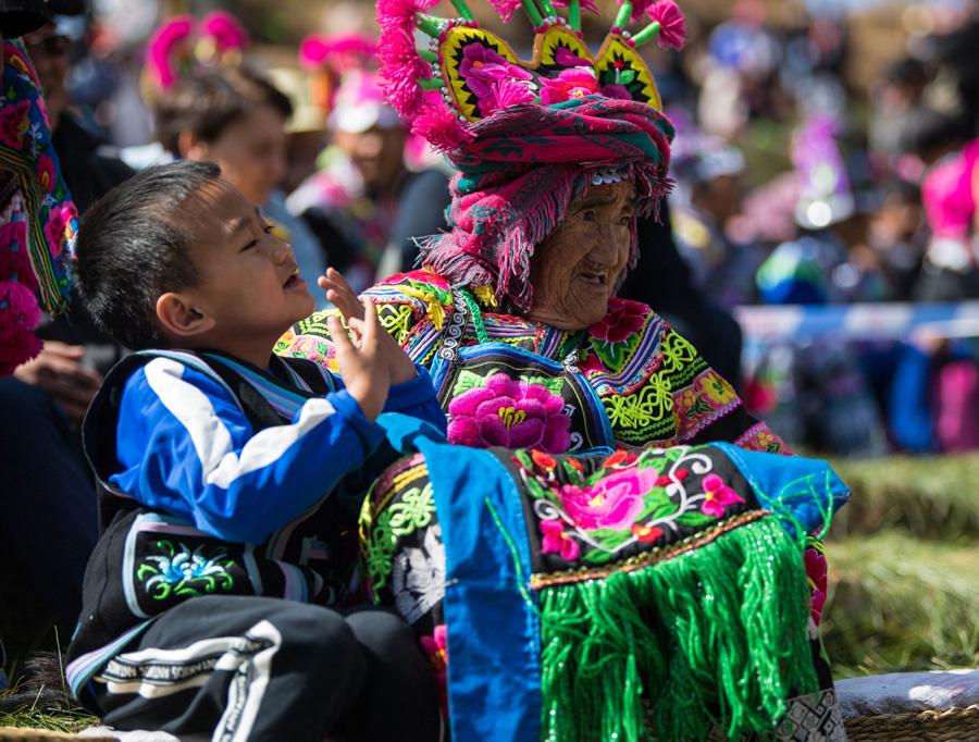 Villagers watch the Dress Contest Festival on Feb. 19, 2019. (Photo/Xinhua)