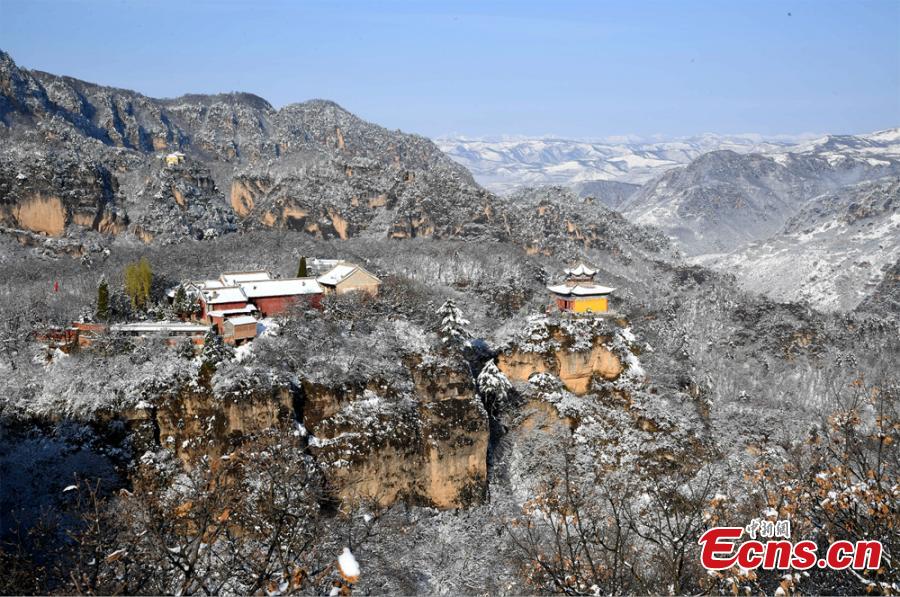 A view of the snow-covered Kongtong Mountain, one of the sacred mountains of Taoism, in Pingliang City, Gansu Province in mid-February. The spot is noted for its marvelous natural scenery and is referred to as \