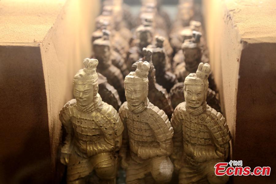 Chocolate replicas of the Terracotta warriors are seen at a hotel in Xi\'an, Northwest China\'s Shaanxi Province, Feb. 20, 2019. The chocolate figures are 15 centimeters tall and sell for 68 yuan ($10). Xi\'an is home to the Terracotta Army, constructed to accompany the tomb of China\'s First Emperor Qin Shihuang as an afterlife guard. (Photo: China News Service/Zhang Yuan)