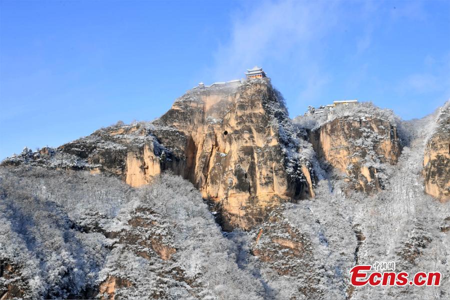 A view of the snow-covered Kongtong Mountain, one of the sacred mountains of Taoism, in Pingliang City, Gansu Province in mid-February. The spot is noted for its marvelous natural scenery and is referred to as \