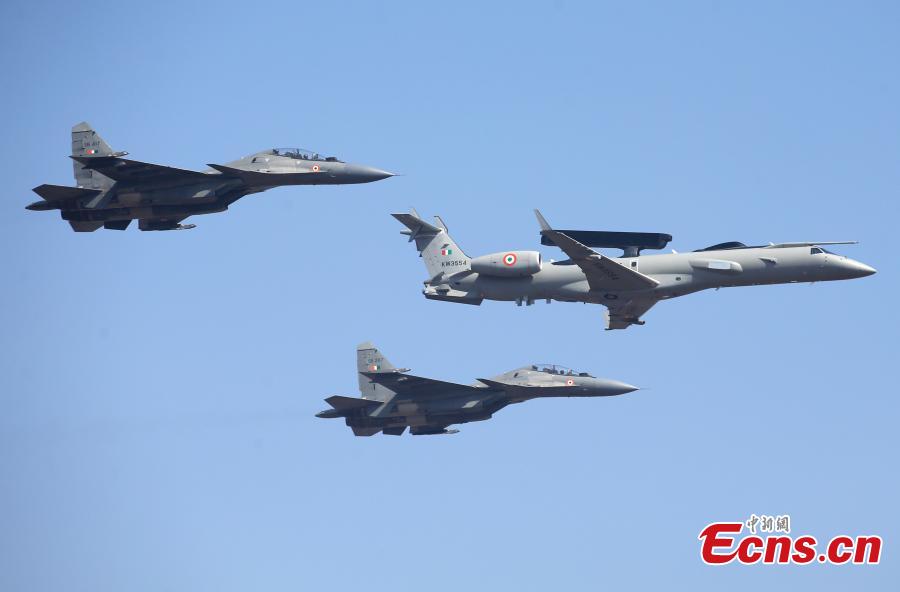 <?php echo strip_tags(addslashes(Indian Air Force Embraer, center, and Sukhoi Su-30 MKI fighter aircrafts perform aerobatic maneuvers on the inaugural day of Aero India 2019 at Yelahanka air base in Bangalore, India, Feb. 20, 2019. Over 400 exhibitors from more than 20 countries and regions are participating in Aero India show this year. (Photo/Agencies))) ?>
