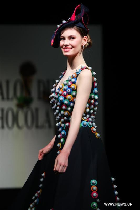 <?php echo strip_tags(addslashes(A model displays a chocolate dress during the opening show of the 6th Brussels Chocolate Salon in Brussels, Belgium, Feb. 21, 2019. The 6th Brussels Chocolate Salon (Salon du Chocolat Brussels) kicked off here on Thursday. In the following three days, 130 chocolatiers, pastry chefs, confectioners, designers and cocoa experts of international reputation in attendance will share and exhibit chocolate in all its delectable forms. (Xinhua/Zheng Huansong))) ?>
