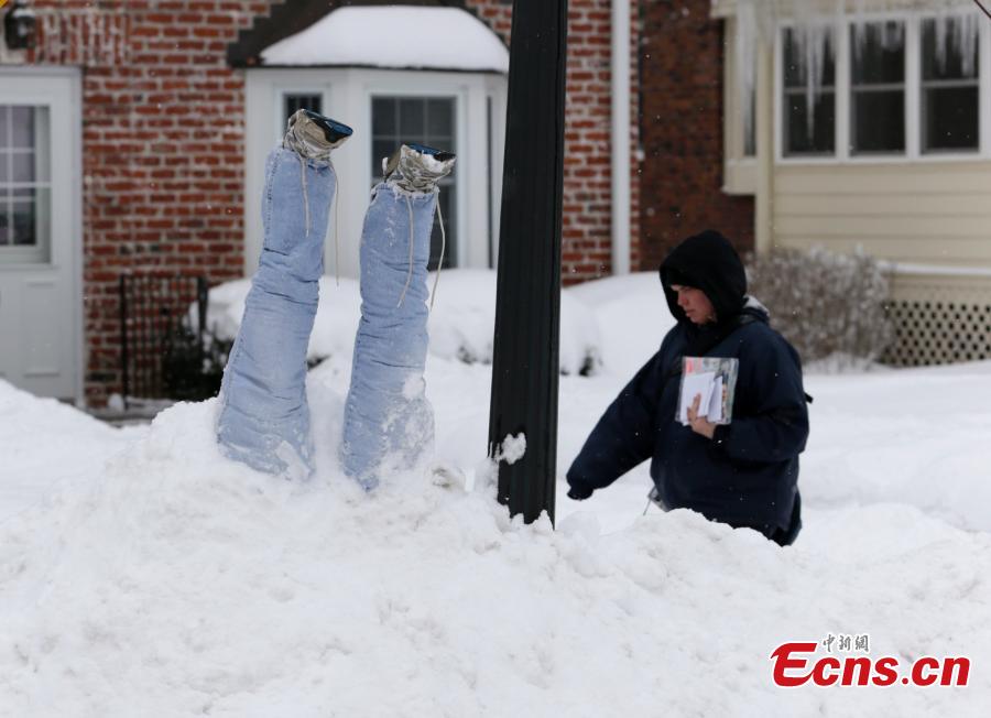 An upside-down pair of pants is seen atop a mound of snow, Feb. 20, 2019, the result of yet another snow storm to hit Omaha, Nebraska. The latest winter storm dumped more snow on top of the existing snow, creating a problem of what to do with all the cleared snow. (Photo/Agencies)