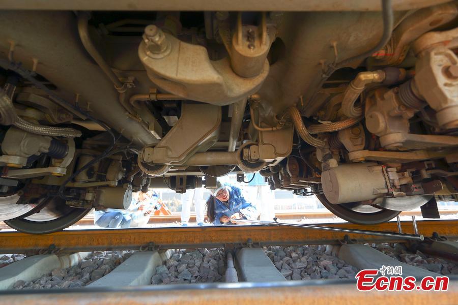 A technician participates in a drill simulating a mechanical failure on a high-speed train in Taiyuan, North China’s Shanxi Province, Feb. 21, 2019. The team at the high-speed train service station in Taiyuan, established on March 8, 2018, is comprised of 19 female technicians with an average age of 23 years, the first its kind in China. They are responsible for emergency responses related to high-speed trains heading to Beijing. (Photo: China News Service/Zhang Yun)