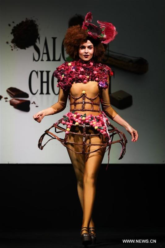 <?php echo strip_tags(addslashes(A model displays a chocolate dress during the opening show of the 6th Brussels Chocolate Salon in Brussels, Belgium, Feb. 21, 2019. The 6th Brussels Chocolate Salon (Salon du Chocolat Brussels) kicked off here on Thursday. In the following three days, 130 chocolatiers, pastry chefs, confectioners, designers and cocoa experts of international reputation in attendance will share and exhibit chocolate in all its delectable forms. (Xinhua/Zheng Huansong))) ?>