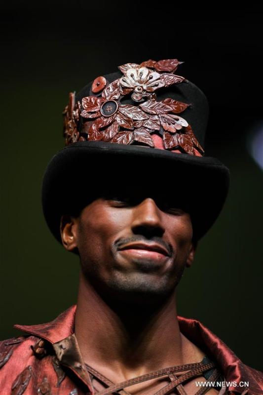 A model wears a chocolate headdress during the opening show of the 6th Brussels Chocolate Salon in Brussels, Belgium, Feb. 21, 2019. The 6th Brussels Chocolate Salon (Salon du Chocolat Brussels) kicked off here on Thursday. In the following three days, 130 chocolatiers, pastry chefs, confectioners, designers and cocoa experts of international reputation in attendance will share and exhibit chocolate in all its delectable forms. (Xinhua/Zheng Huansong)