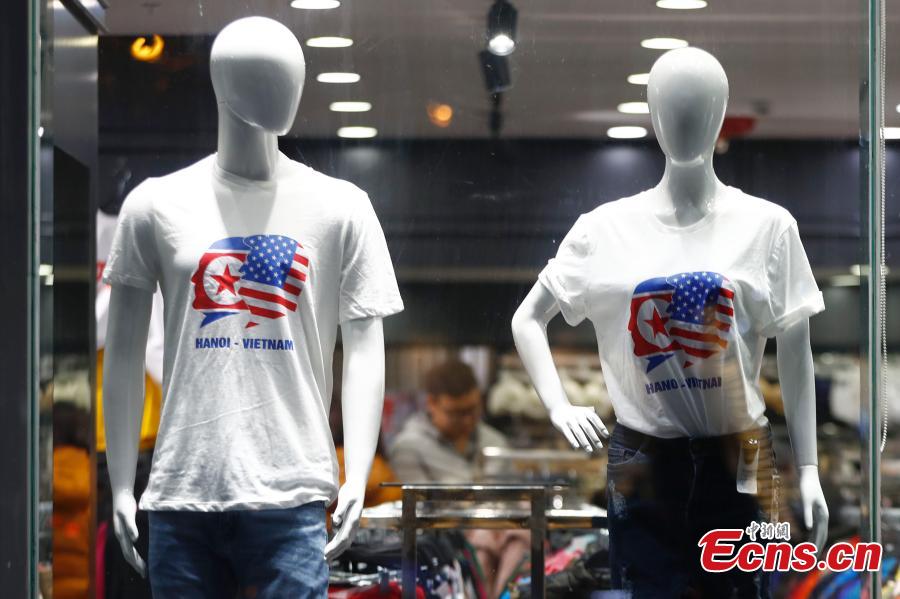 T-shirts emblazoned with the flags of the U.S. and the Democratic People\'s Republic of Korea are displayed at a shop before the Trump-Kim summit in Hanoi, Vietnam, Feb.25, 2019. (Photo: China News Service/Fu Tian)